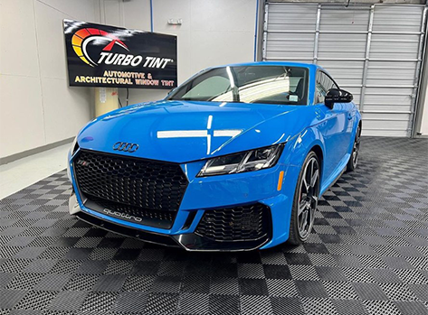 Blue Audi TT RS with fresh tint in the Turbo Tint Cary bay