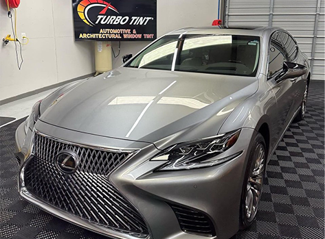 Silver Lexus LS with window tint in the Turbo Tint Cary bay